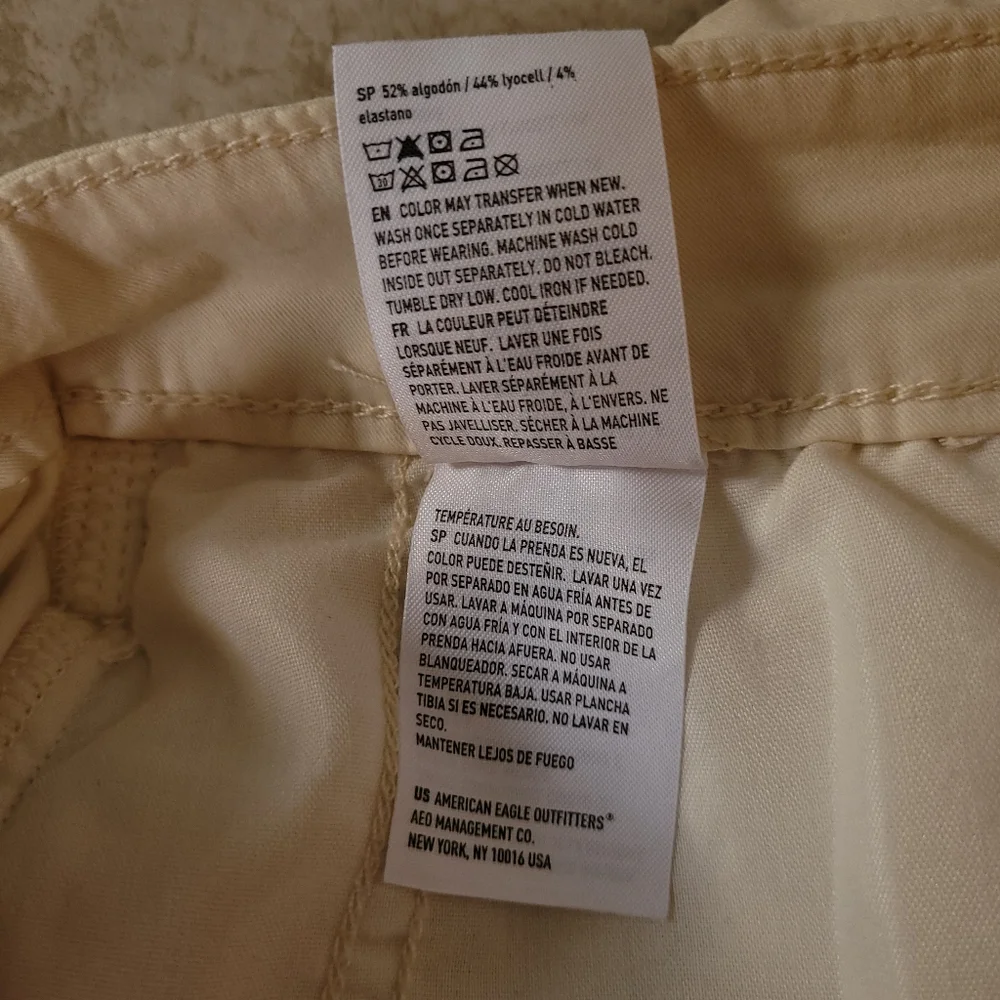 American Eagle Pleated Cream High-Waisted Mini Skirt - Picture 7 of 11